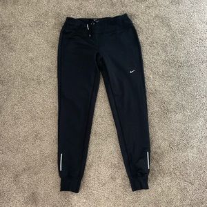 Nike DRI-FIT joggers.